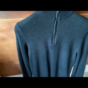 Black Calvin Klein quarter zip sweater.